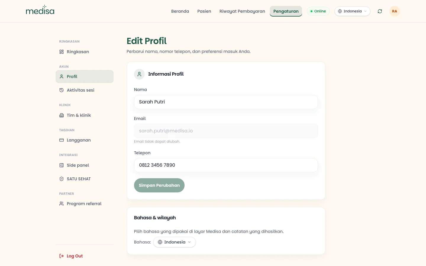 Halaman edit profil dengan kolom nama dan telepon yang bisa diubah, kolom email yang terkunci, serta pemilih bahasa